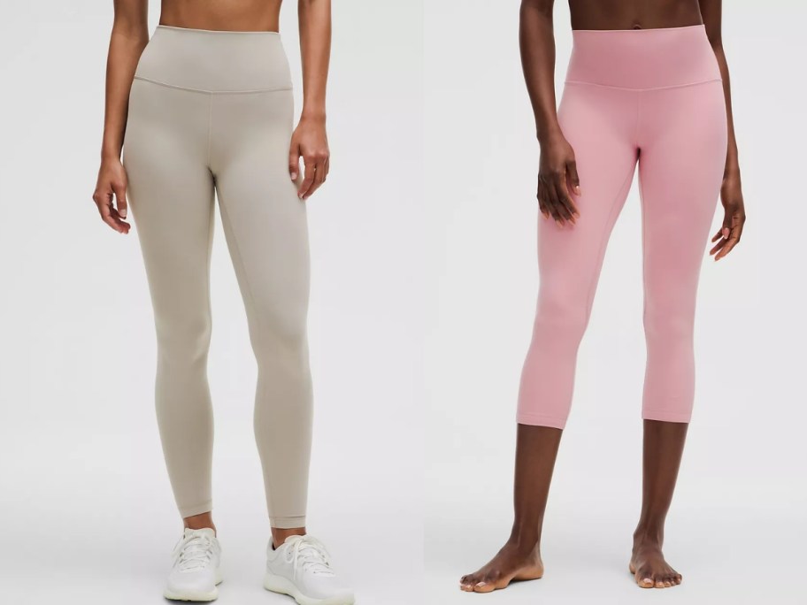 the lower half of 2 women showing the clothes they are wearing, one is wearing light tan leggings and white sneakers, the other is wearing light pink cropped leggings and no shoes
