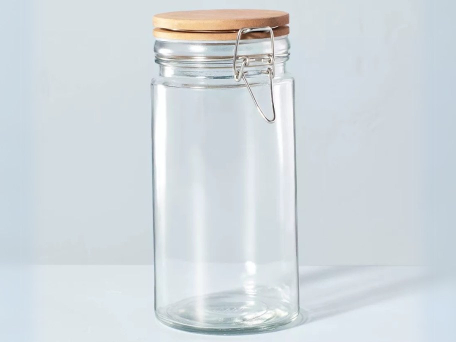 hearth & hand with magnolia glass storage container with clamping wooden lid