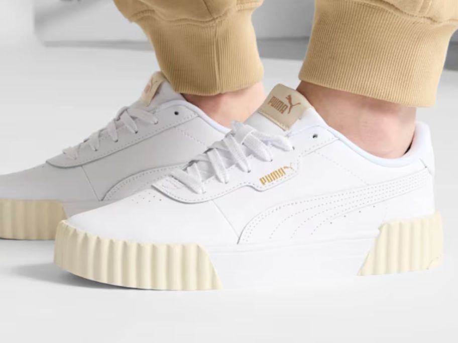 person wearing PUMA Women's Carina 3.0 Shoes