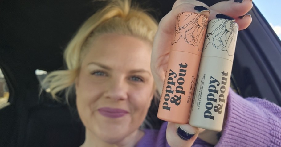 woman holding poppy & pout lip balm