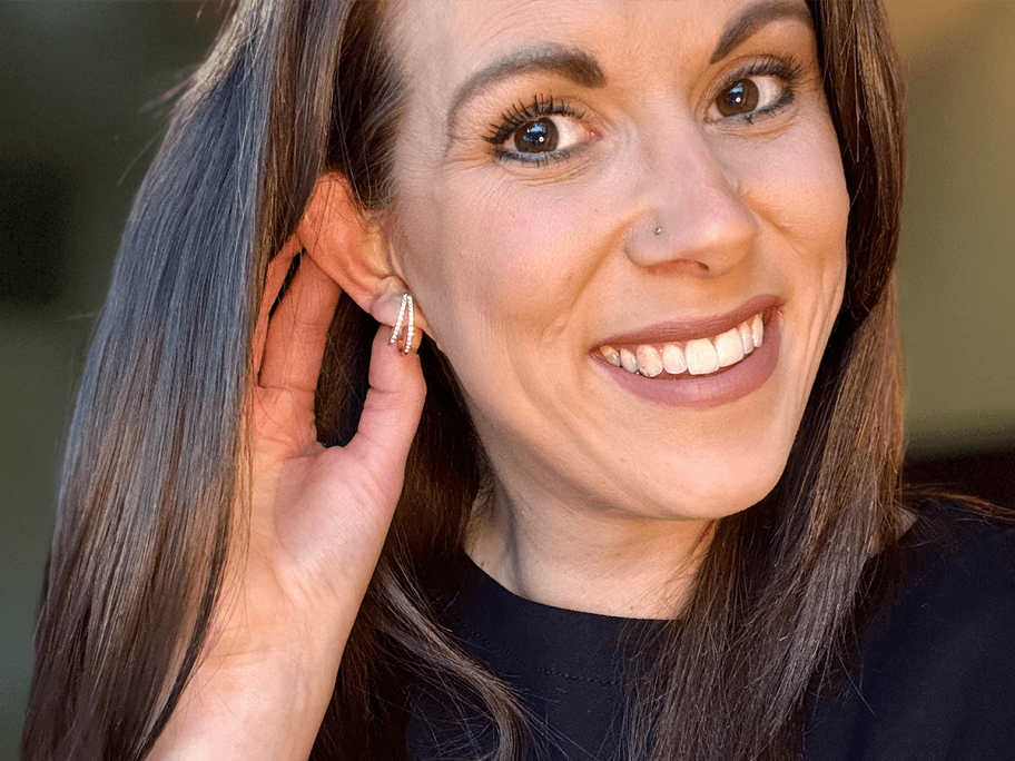 Woman wearing Corina 18K Gold-Plated Swarovski Hoop Earrings