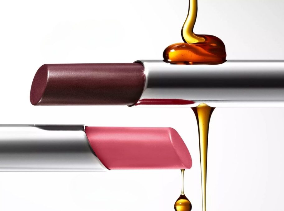 two lip sticks in silver tubes