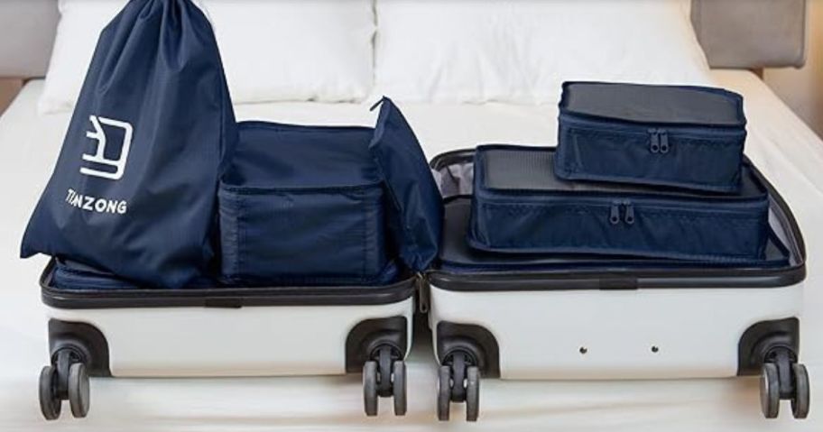 A suitcase opened with packing cubes in it 