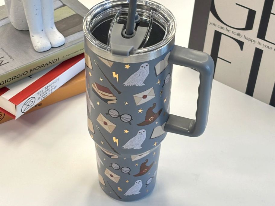 Ashland 40oz Gray Wizard Stainless Steel Insulated Tumbler on desk