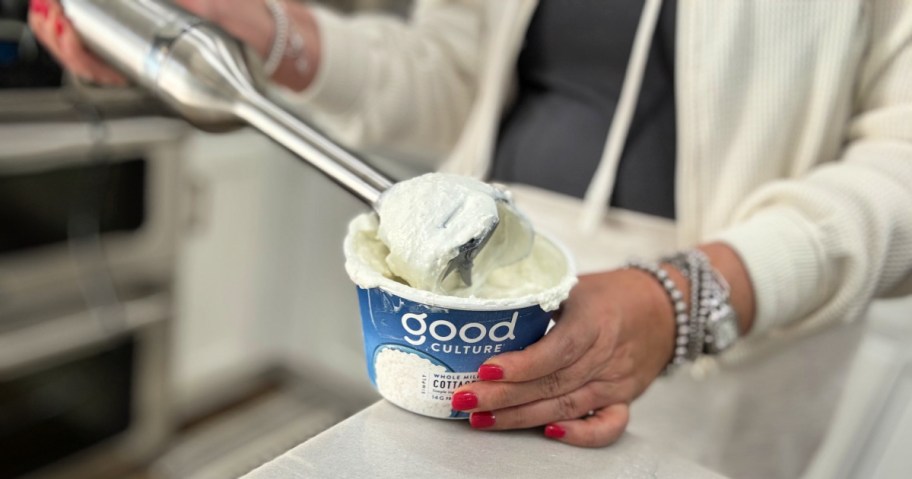 using a hand blender to blend cottage cheese