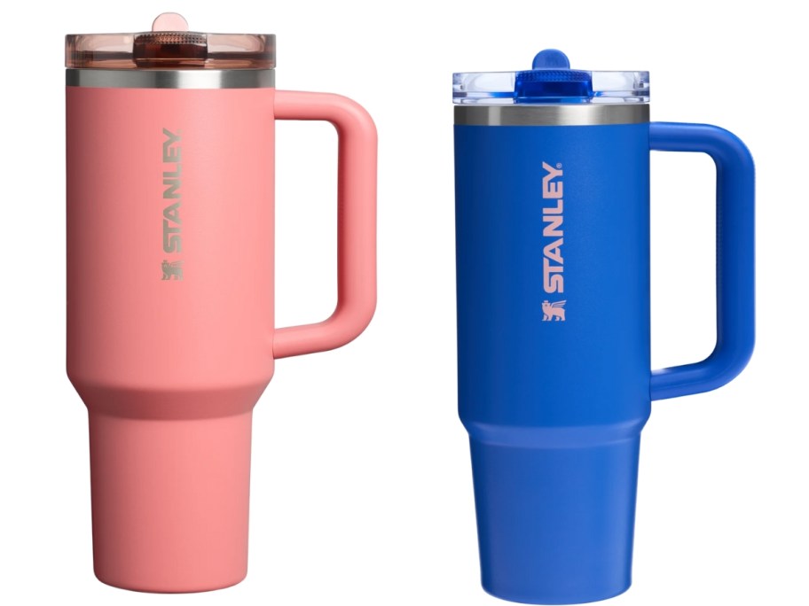 a pink and a blue Stanley tumbler