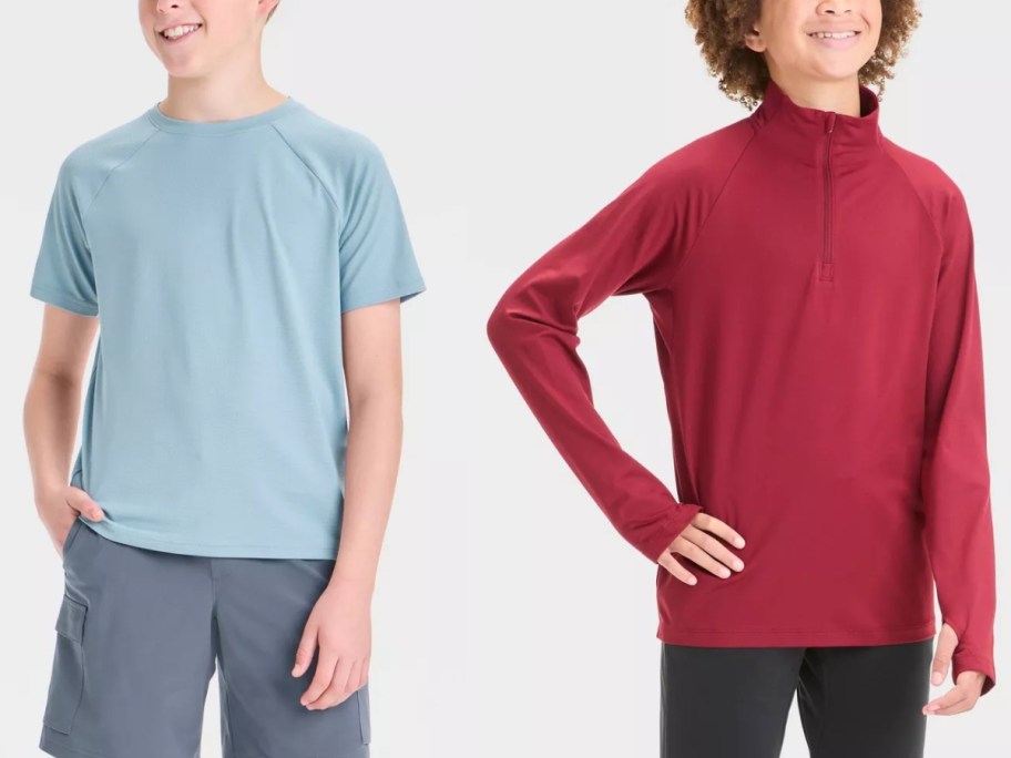 boy wearing a blue t-shirt and boy wearing a red quarter zip sweatshirt