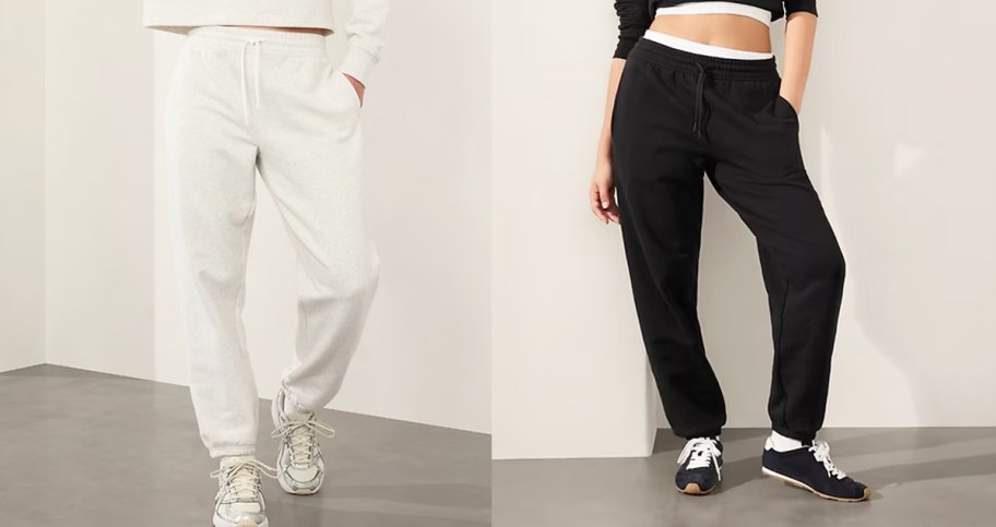two women in grey and black joggers