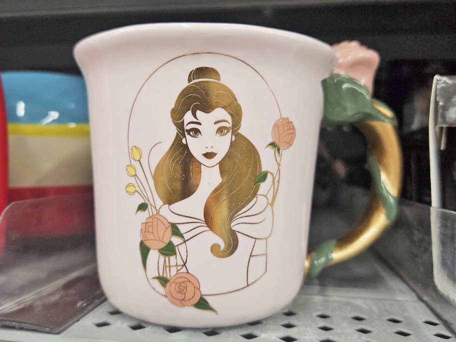 Beauty and The Beast coffee mug with a rose twisted around the handle