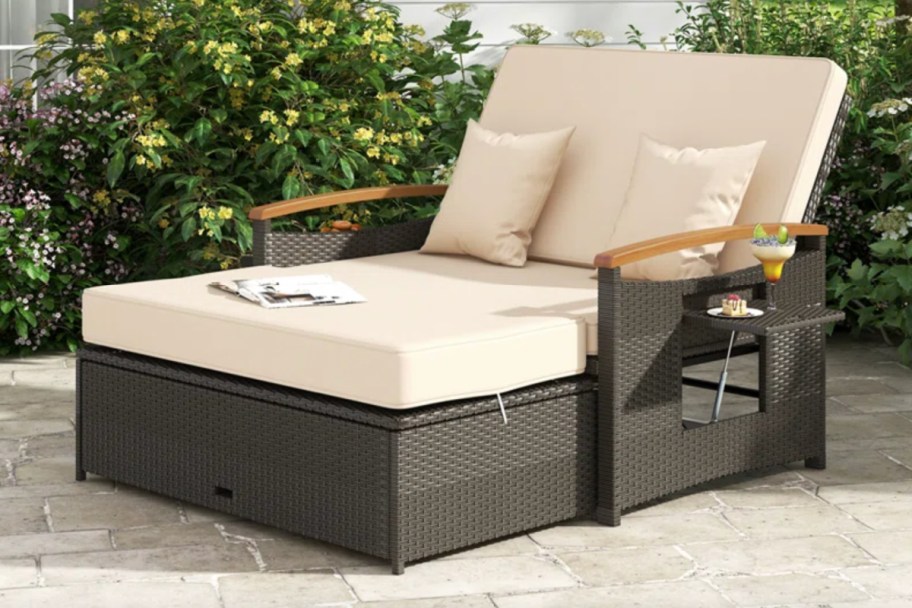 beige and brown wicker patio daybed