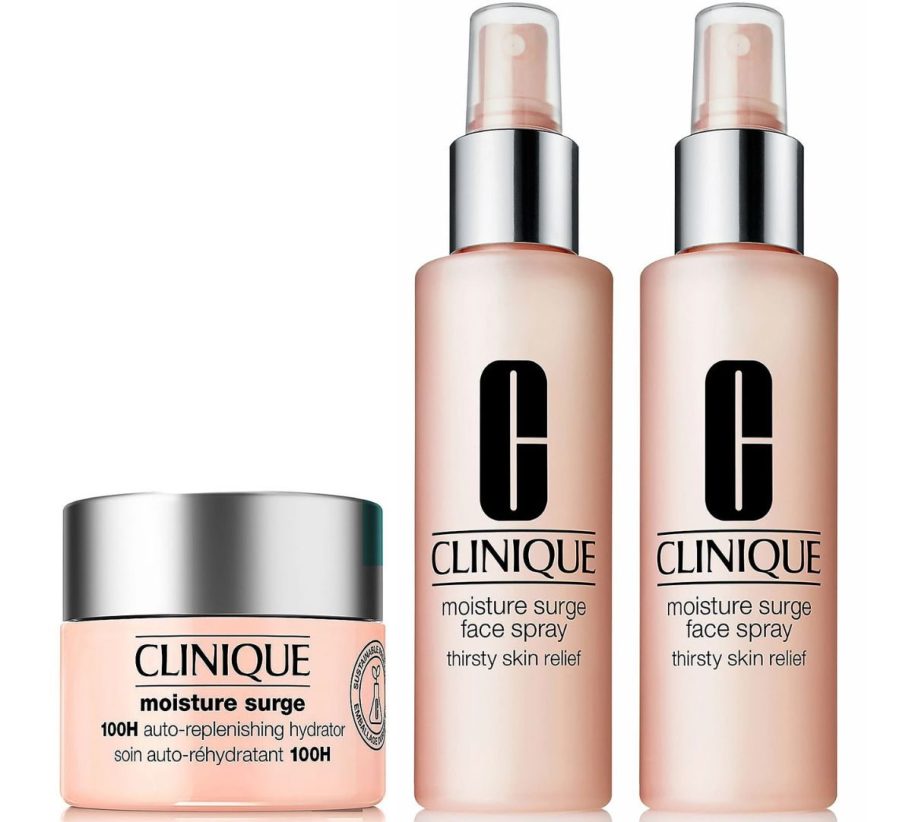 a jar of moisture surge moisturizer shown with two bottles of moisture surge face spray