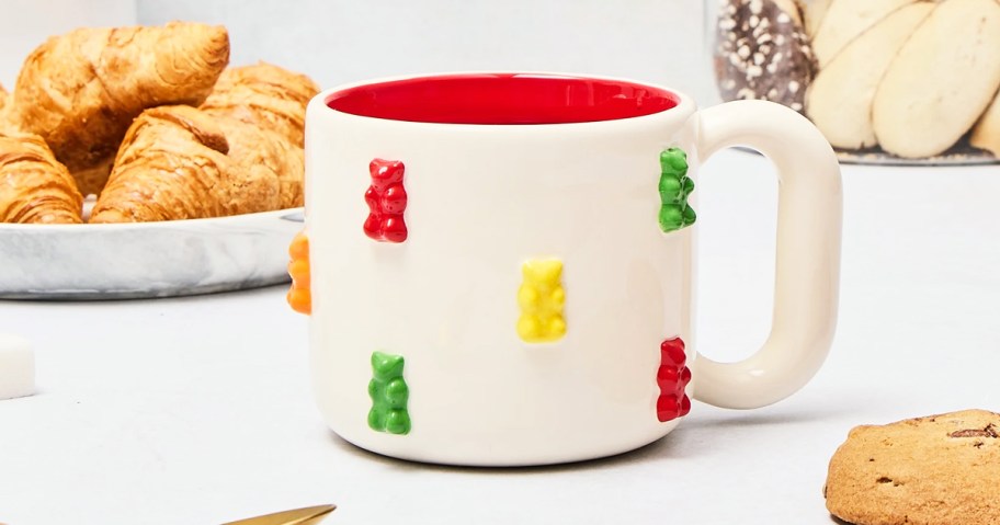 white coffee mug with colorful gummy bears