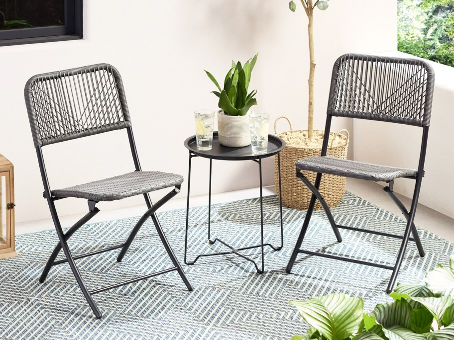 rope bistro chairs and table set on patio