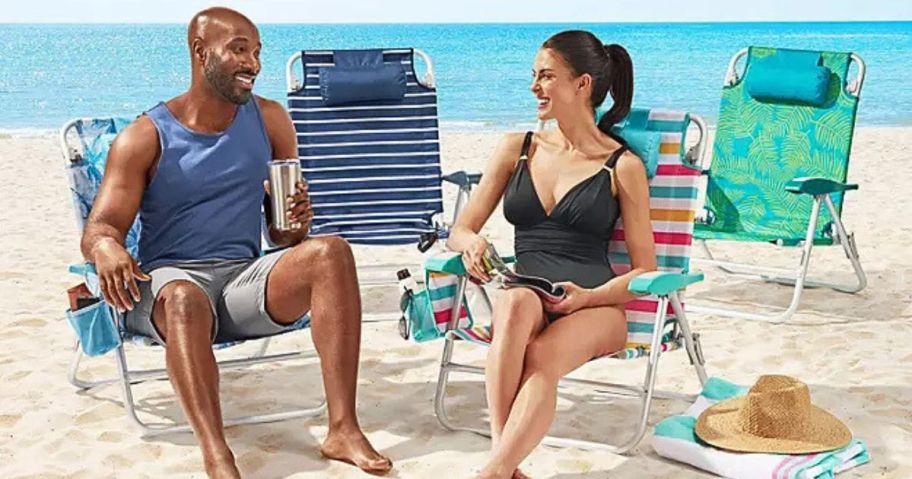 4 Member's Mark Beach Chairs with a man and a woman sitting in two of them