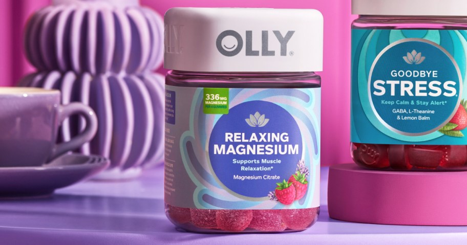 purple bottle of OLLY Relaxing Magnesium Gummies on nightstand
