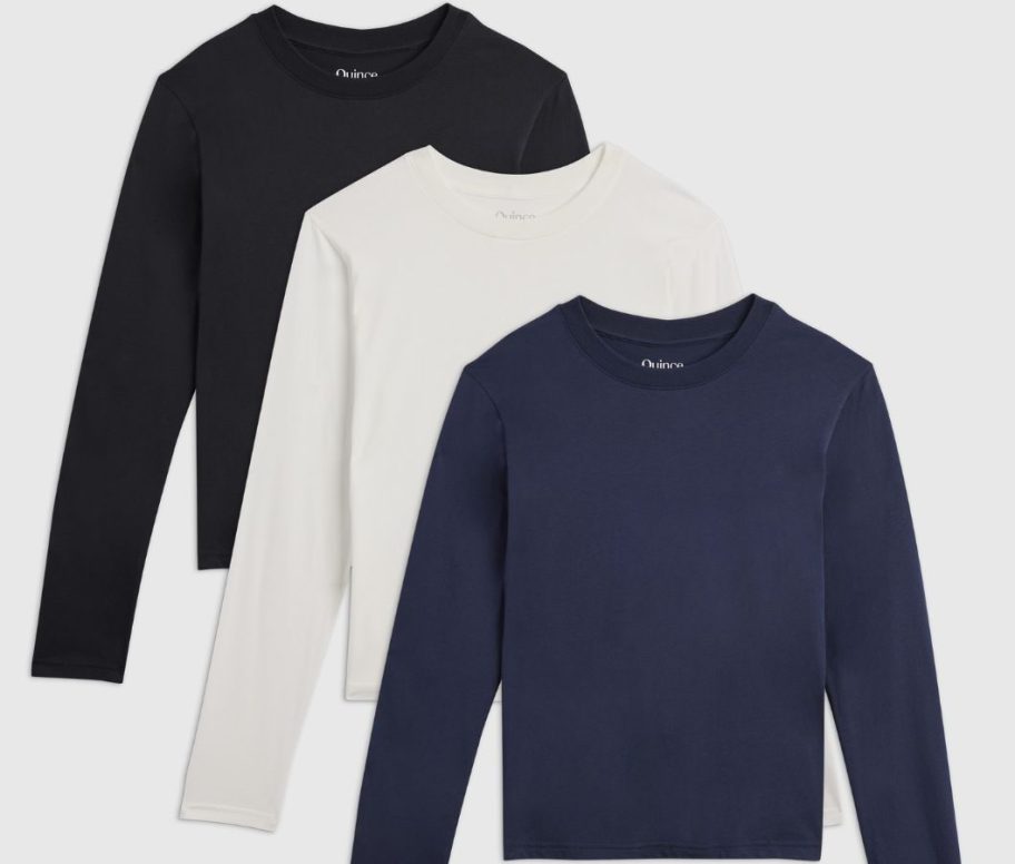Stock images of three Quince Women's Cotton Modal Relaxed Long Sleeve Tees