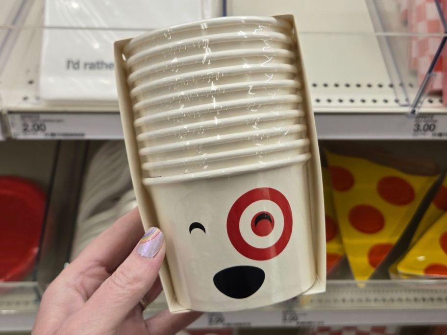 Hand holding a Spritz Target Bullseye Treat Cup 10-Count