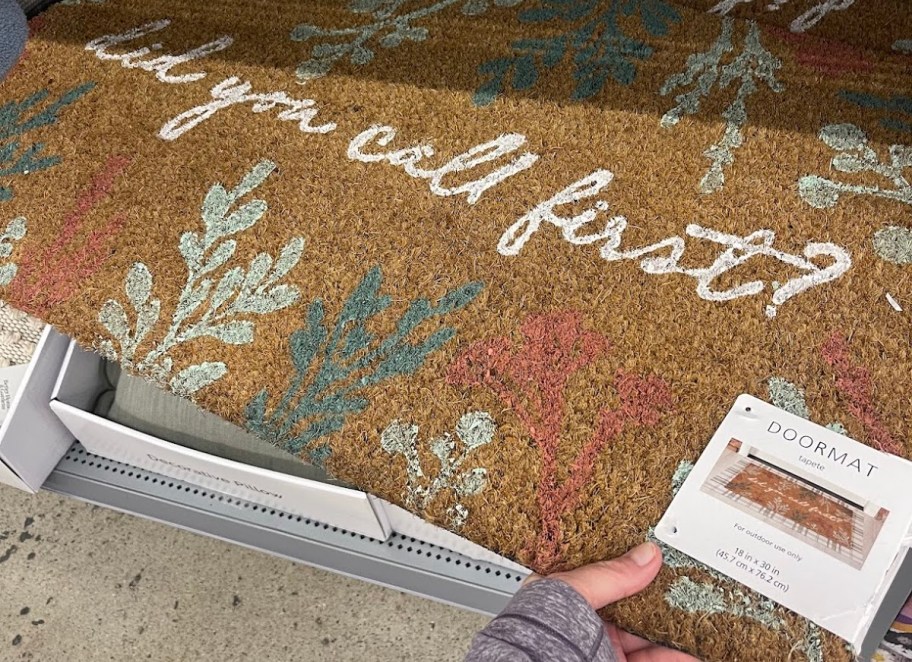 did you call first floral doormat on store shelf