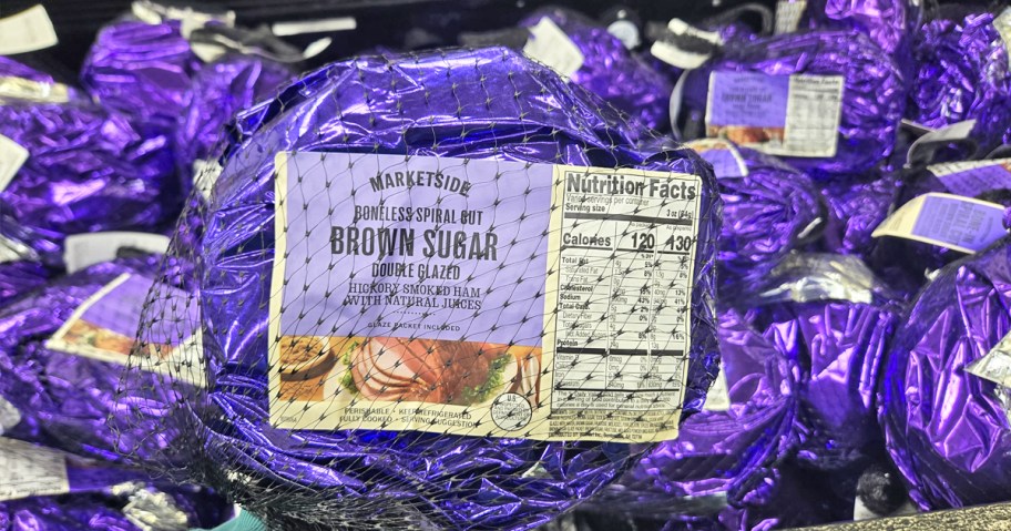 purple spiral brown sugar hams on store display