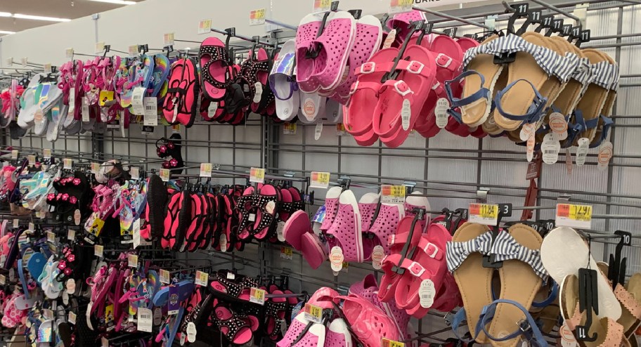 Walmart kids shoes displayed on the wall