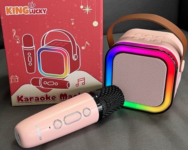 Kinglucky TOP Karaoke Machine for Kids in Pink w/ 1 Wireless Microphones stock image