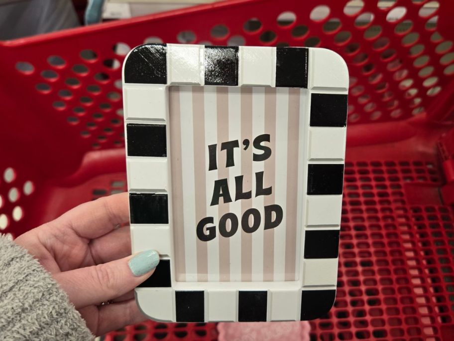 black and white It's All Good Frame in hand in store