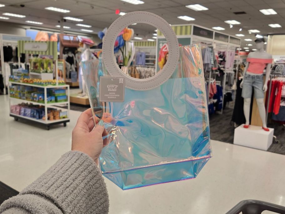 shiny Gift Bag w/ Faux Leather Handle in hand in store