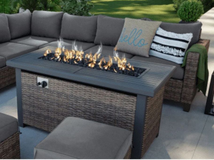 Better Homes & Gardens 50" Brookbury Gas Burning Fire Pit Table on patio