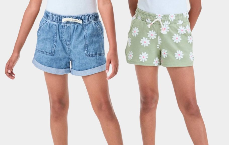 two girls wearing shorts