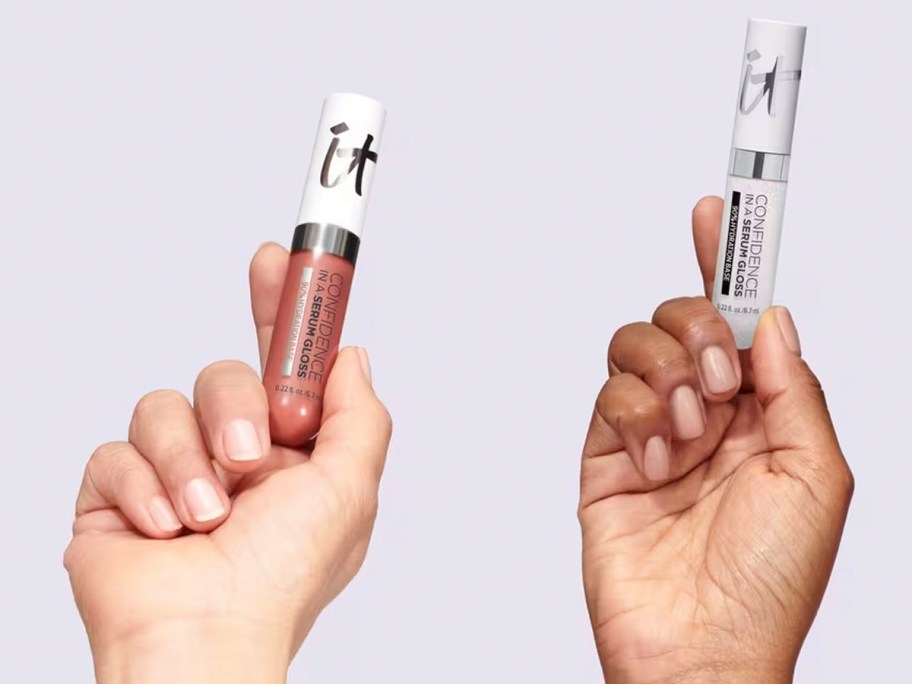 two hands holding it confidence lip gloss