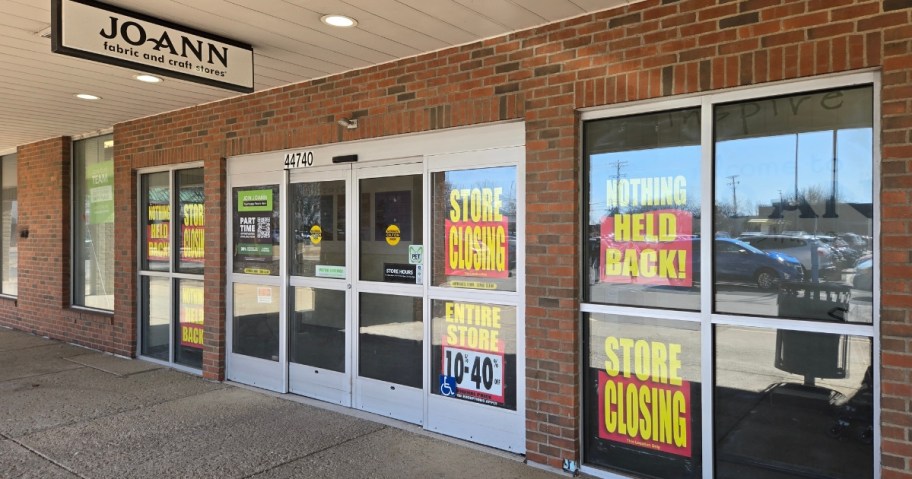 storefront with closing signs
