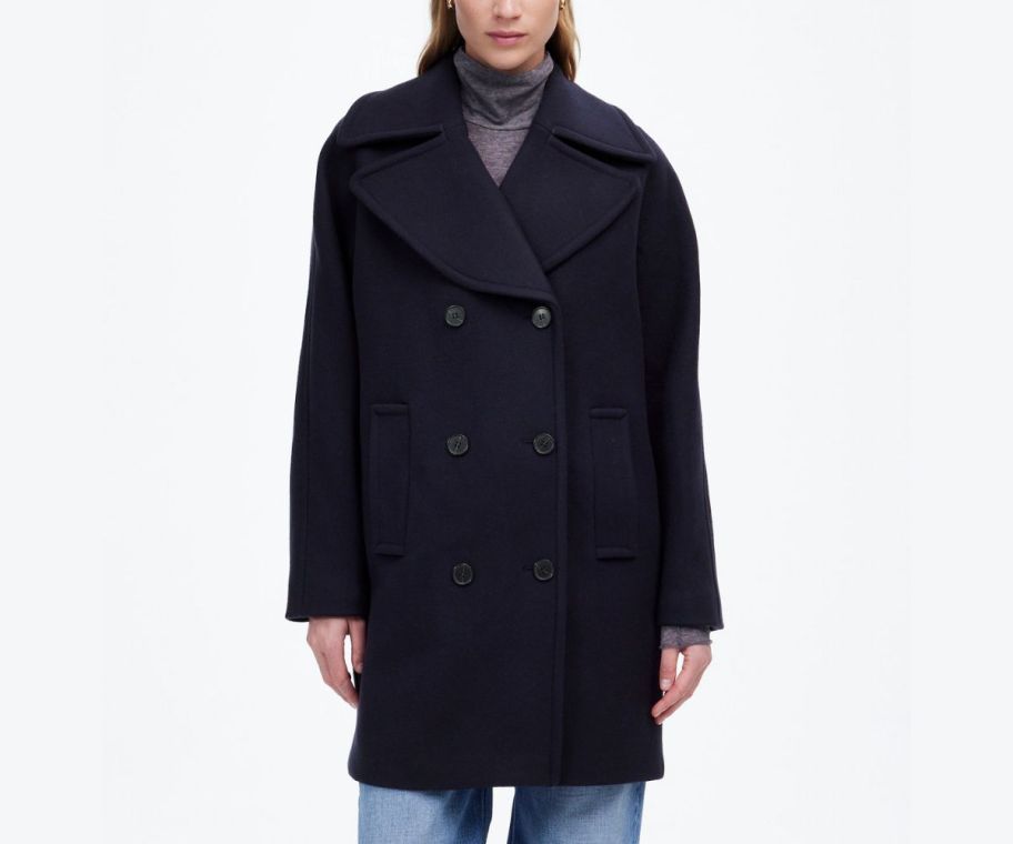 a woman in a madewell peacoat