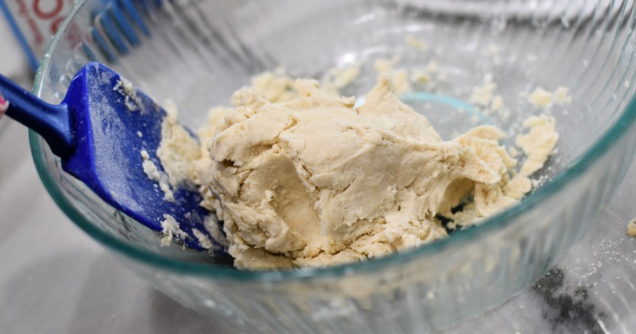 mixing biscuit dough for sourdough biscuits