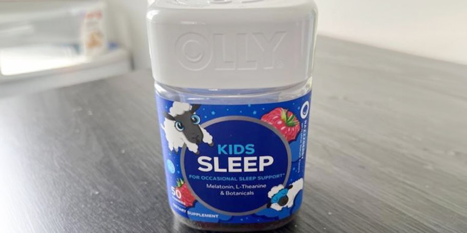 olly kids gummies bottle on table 