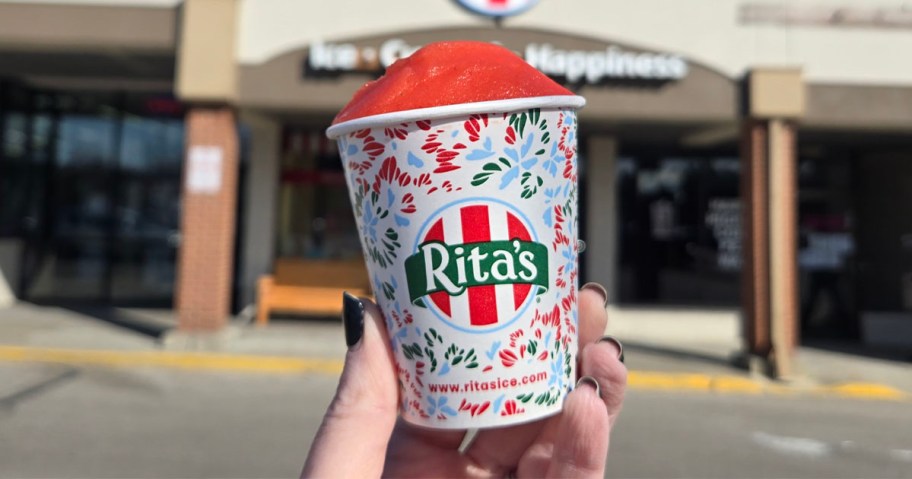 hand holding ritas italian ice cup 