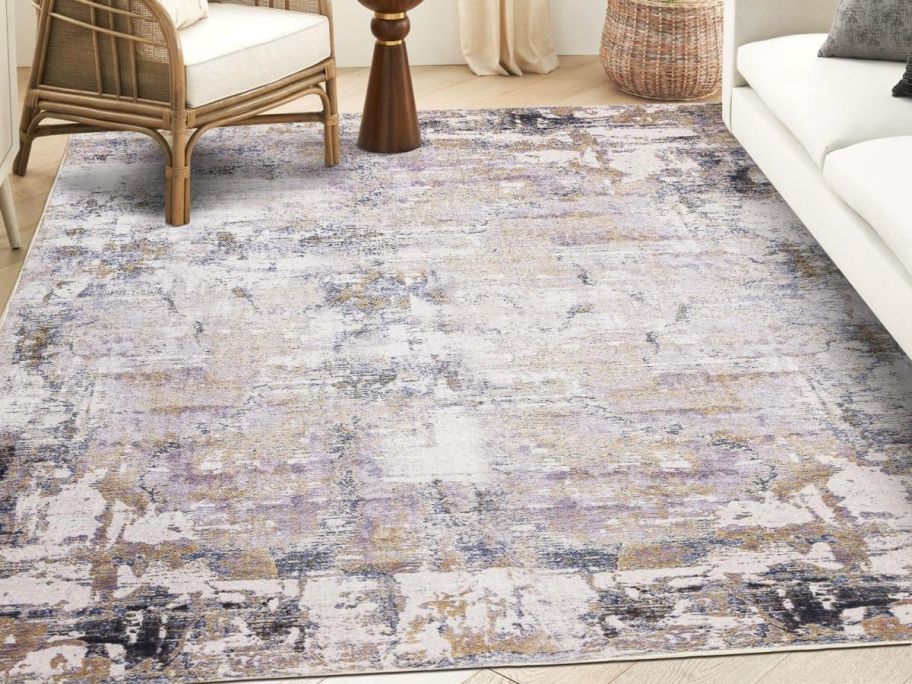 brown and purple printed rug in living room