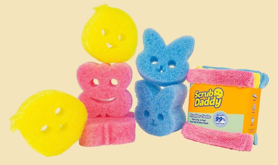 Scrub Daddy 6-Piece Spring Sponges & Microfiber Towel against yellow background