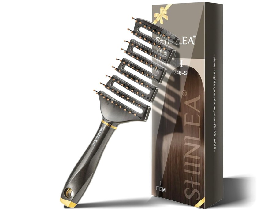 brown hair brush against box