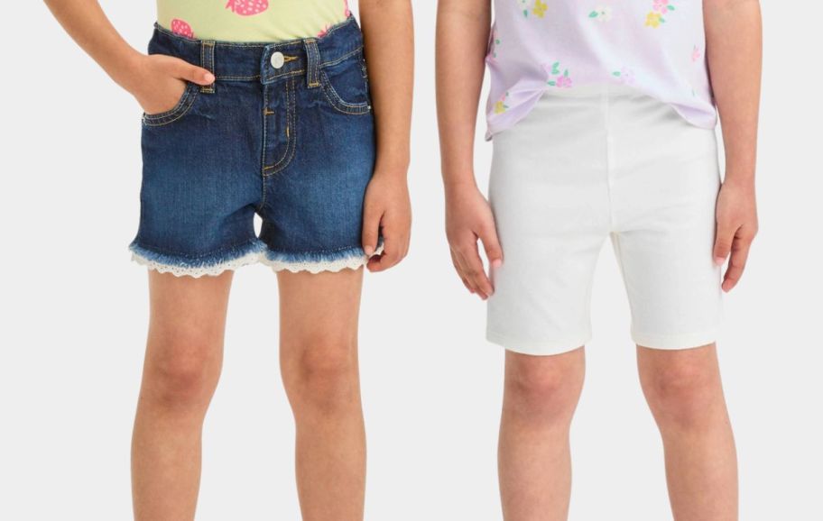 two girls wearing shorts