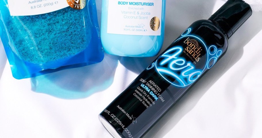 black and blue bottle of Bondi Sands Aero Self Tanning Foam near other beauty products