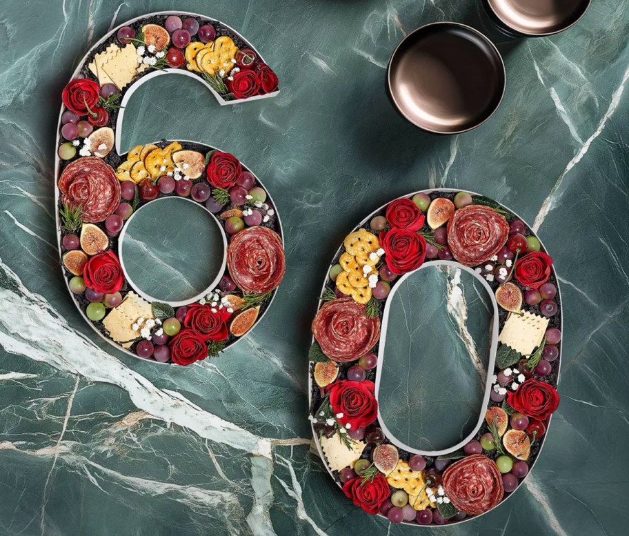 paper box numbers 60 filled with charcuterie and roses