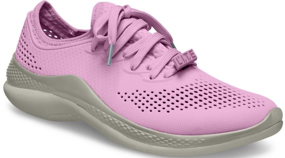 a woman dark pink laceup water shoe