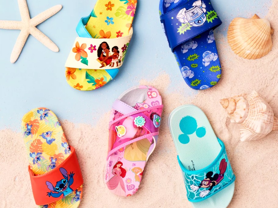 variety of disney character slides on sand