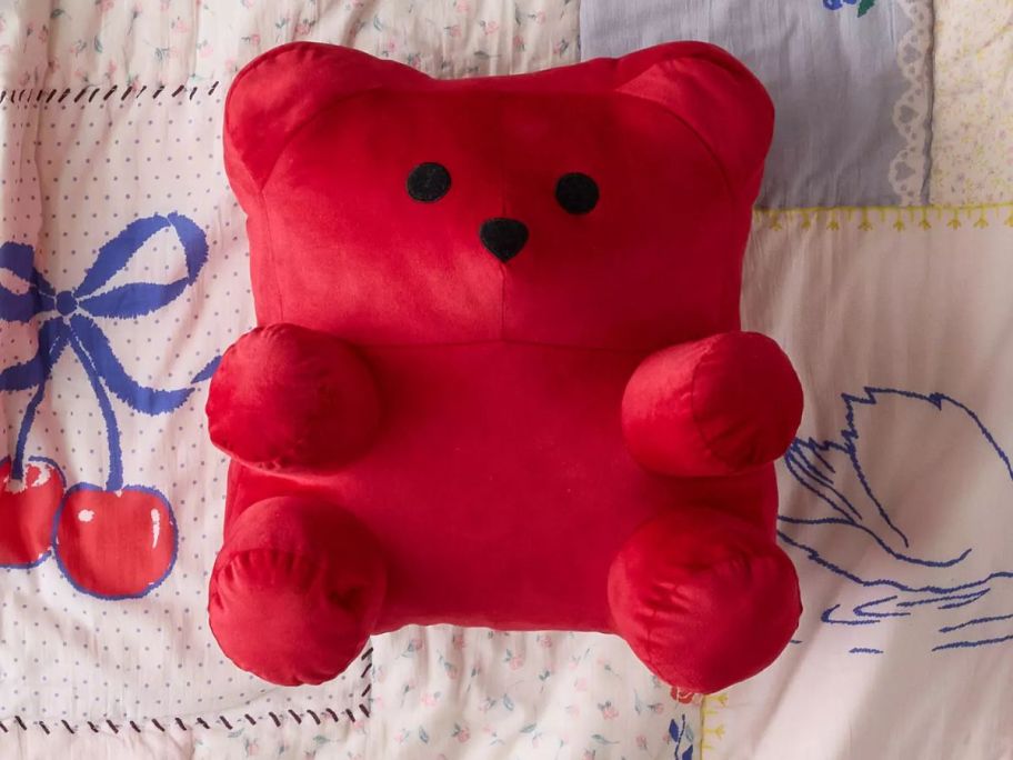 A red plush gummy bear