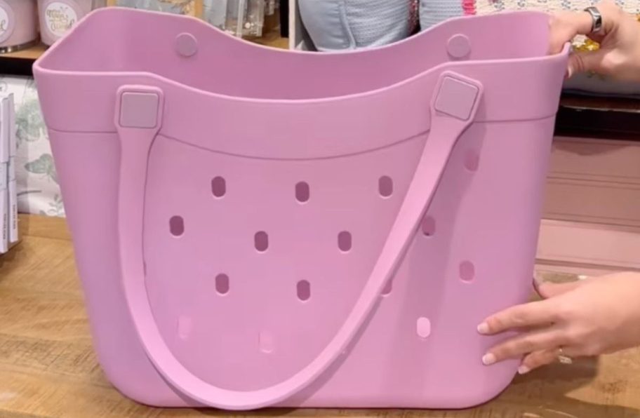 A Kirkland's Curve Carry-All Basket Tote in Pink