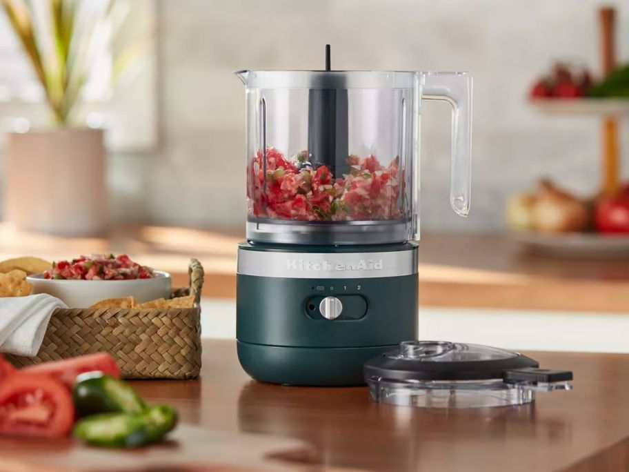 A Hearth & Hand w/ Magnolia KitchenAid Cordless 5-Cup Food Chopper filled with fresh salsa
