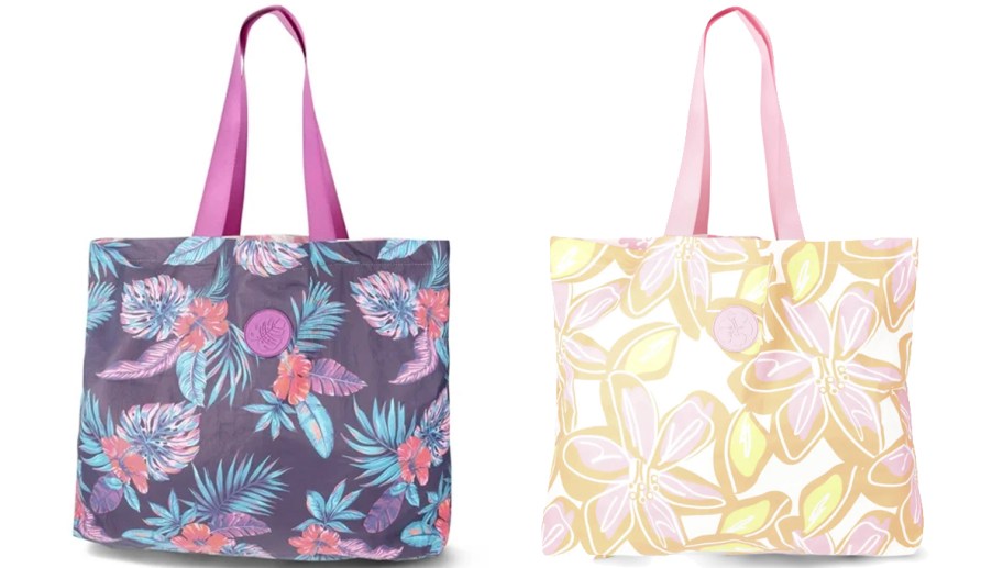 two tropical print tote bags with pink handles