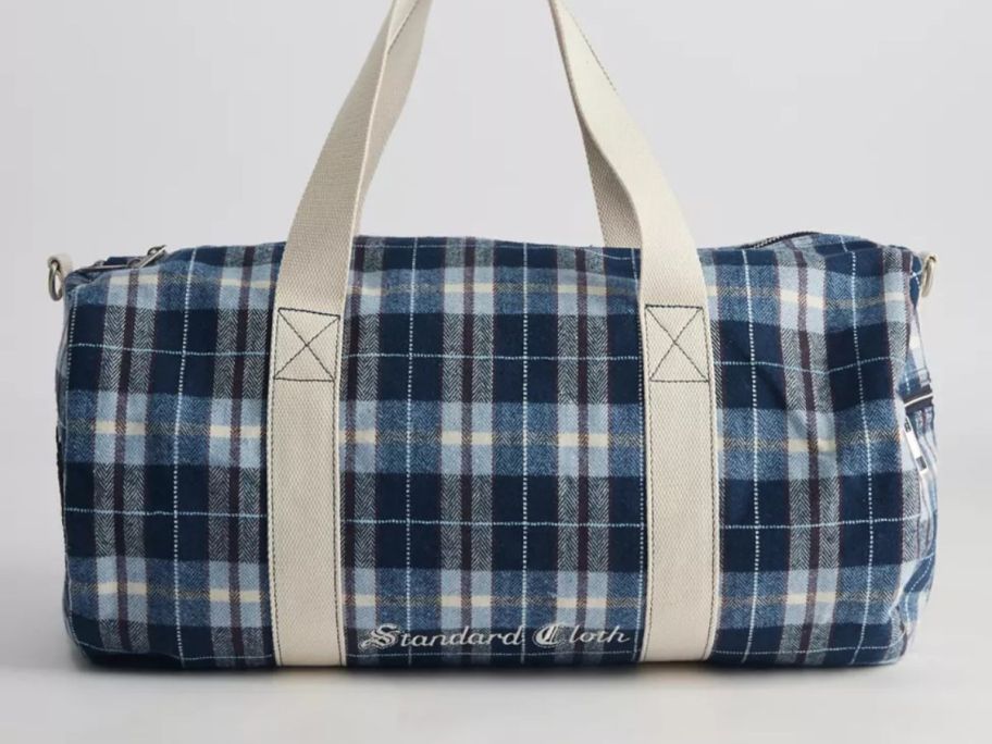 A blue and white plaid bag