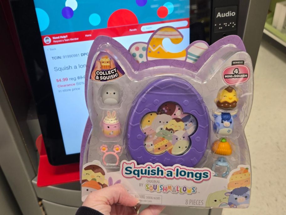 hand holding a pack of Squishmallows Easter Squish-a-longs toys