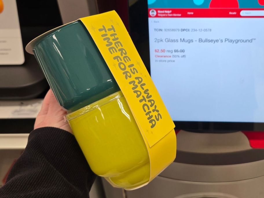 Hand holding a Two-Pack of Target Bullseye Matcha Cups